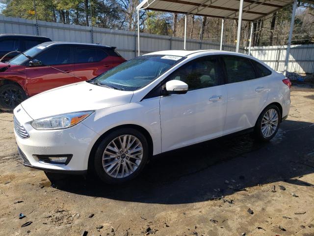 Image 1 of 2016 FORD FOCUS TITANIUM 2016 with VIN 1FADP3J24GL211361