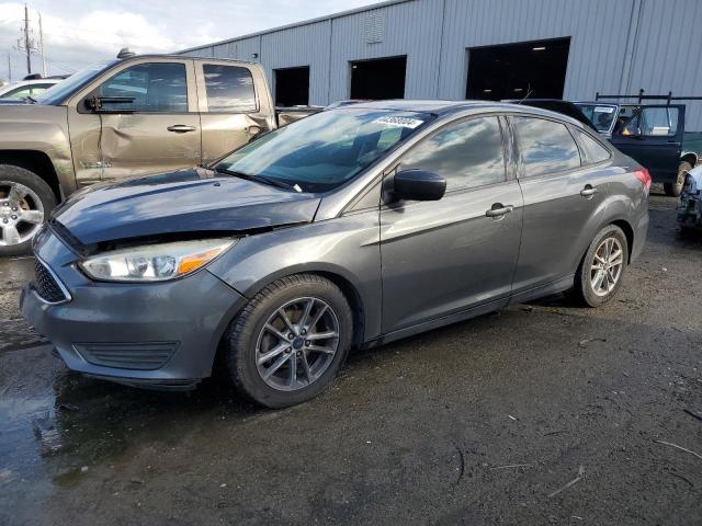 Image 1 of 2018 FORD FOCUS SE 2018 with VIN 1FADP3FE8JL299924