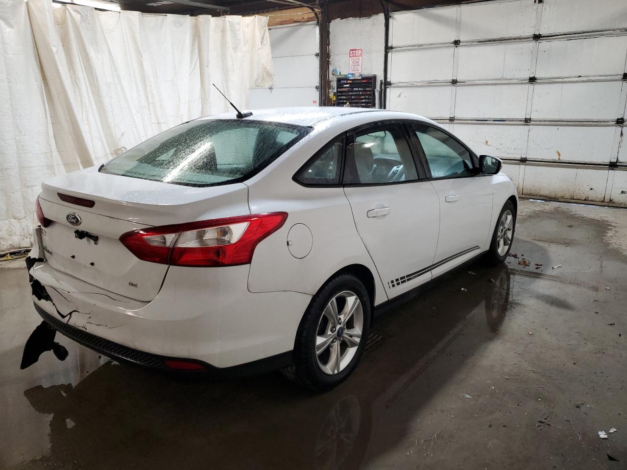 Image 3 of 2014 FORD FOCUS SE 2014 with VIN 1FADP3F26EL435382