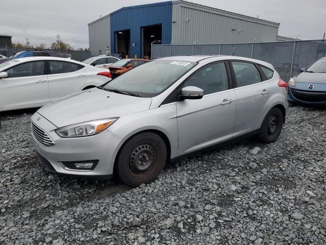 Image 1 of 2017 FORD FOCUS TITANIUM 2017 with VIN 1FADP3N23HL326142