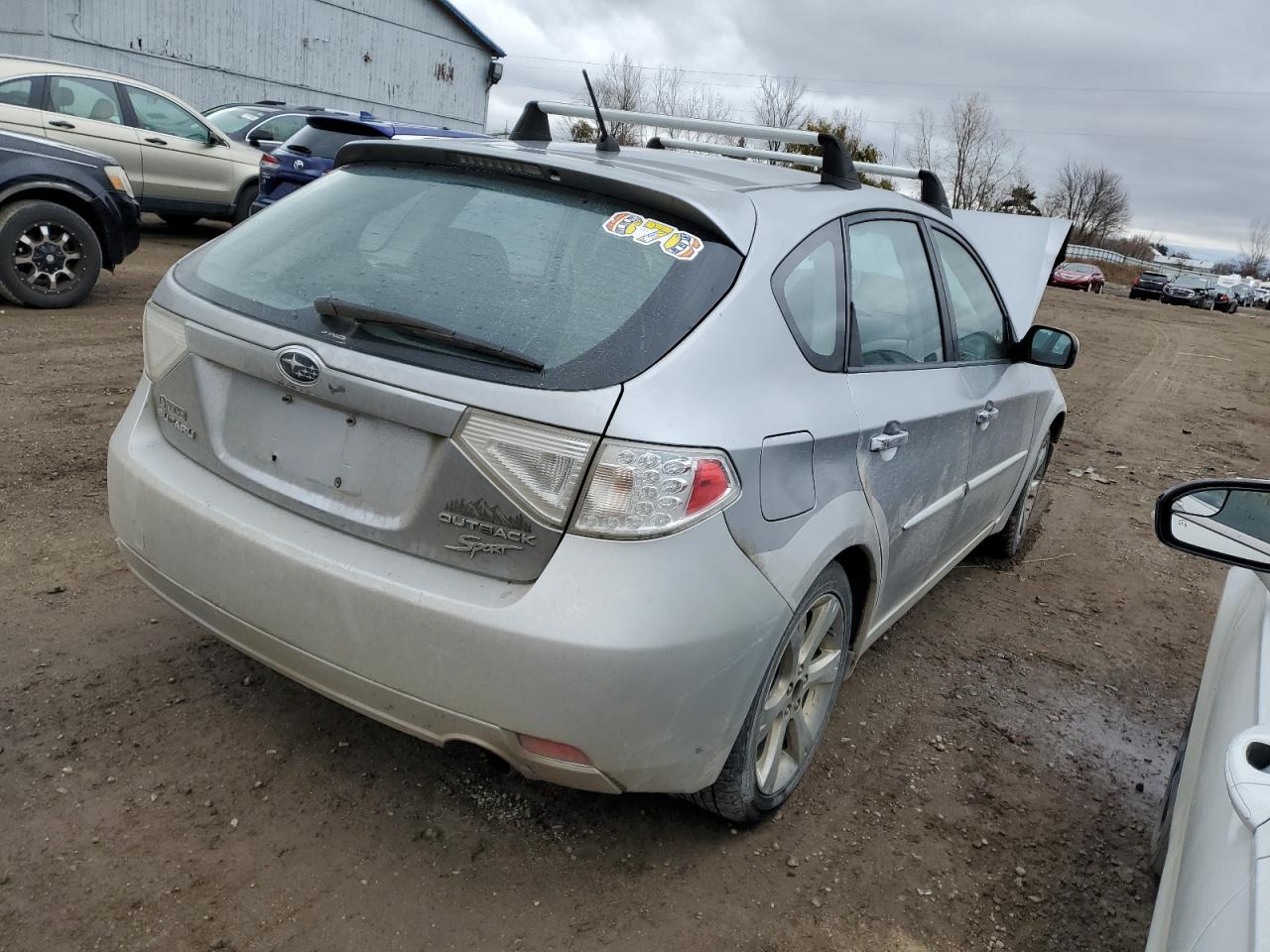 Image 3 of 2009 SUBARU IMPREZA OUTBACK SPORT 2009 with VIN JF1GH63659H815731