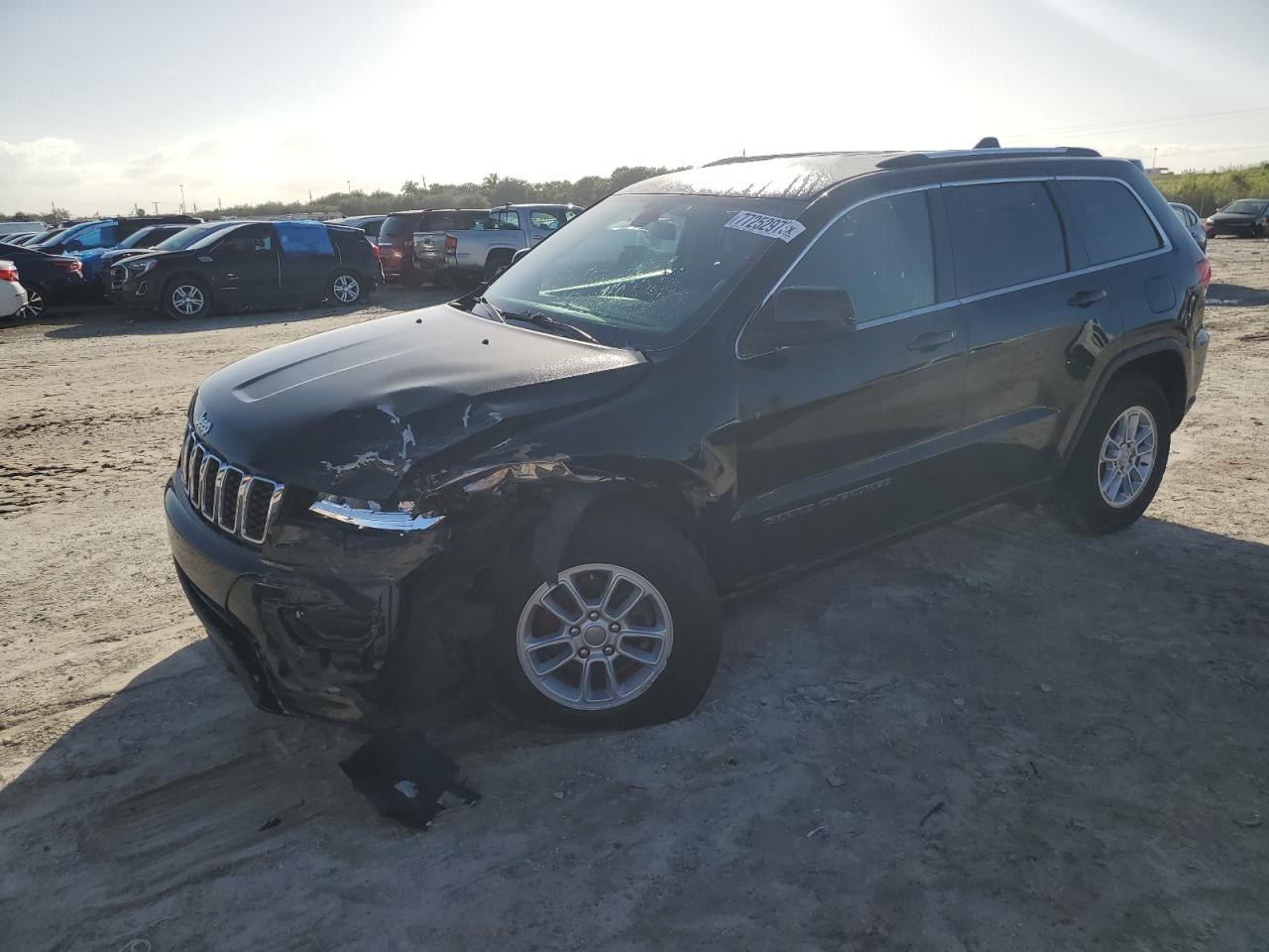Image 1 of 2019 JEEP GRAND CHEROKEE LAREDO 2019 with VIN 1C4RJEAG0KC710577