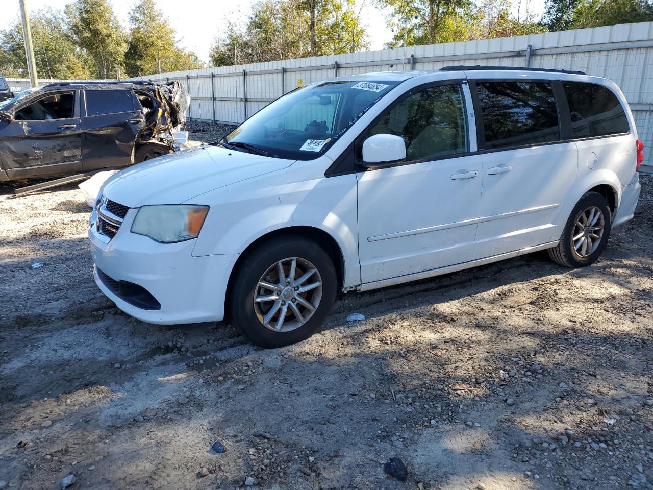 Obraz 1 z 2014 DODGE GRAND CARAVAN SXT 2014 z VIN 2C4RDGCGXER262571