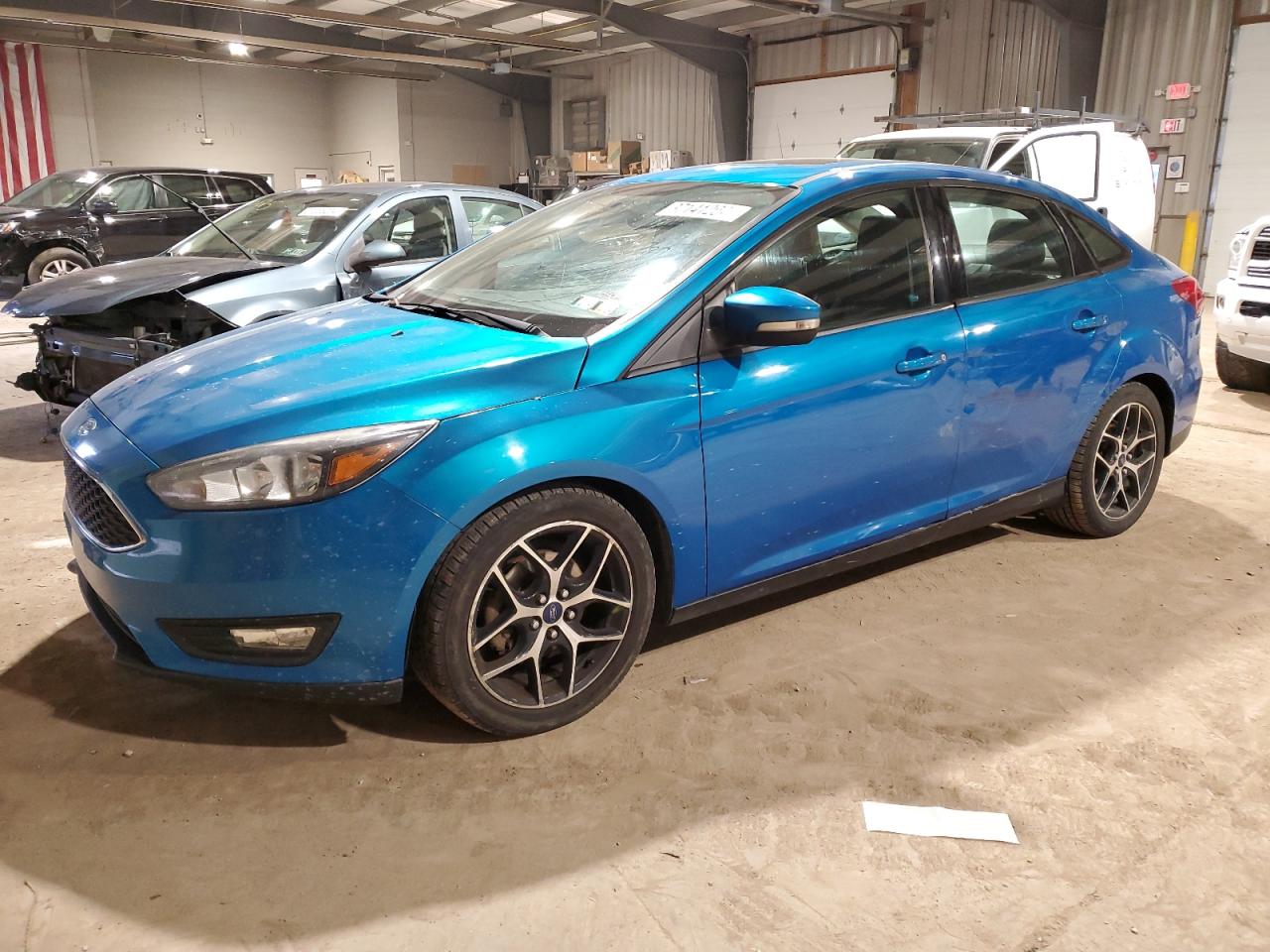 Obraz 1 z 2017 FORD FOCUS SEL 2017 z VIN 1FADP3H24HL203333