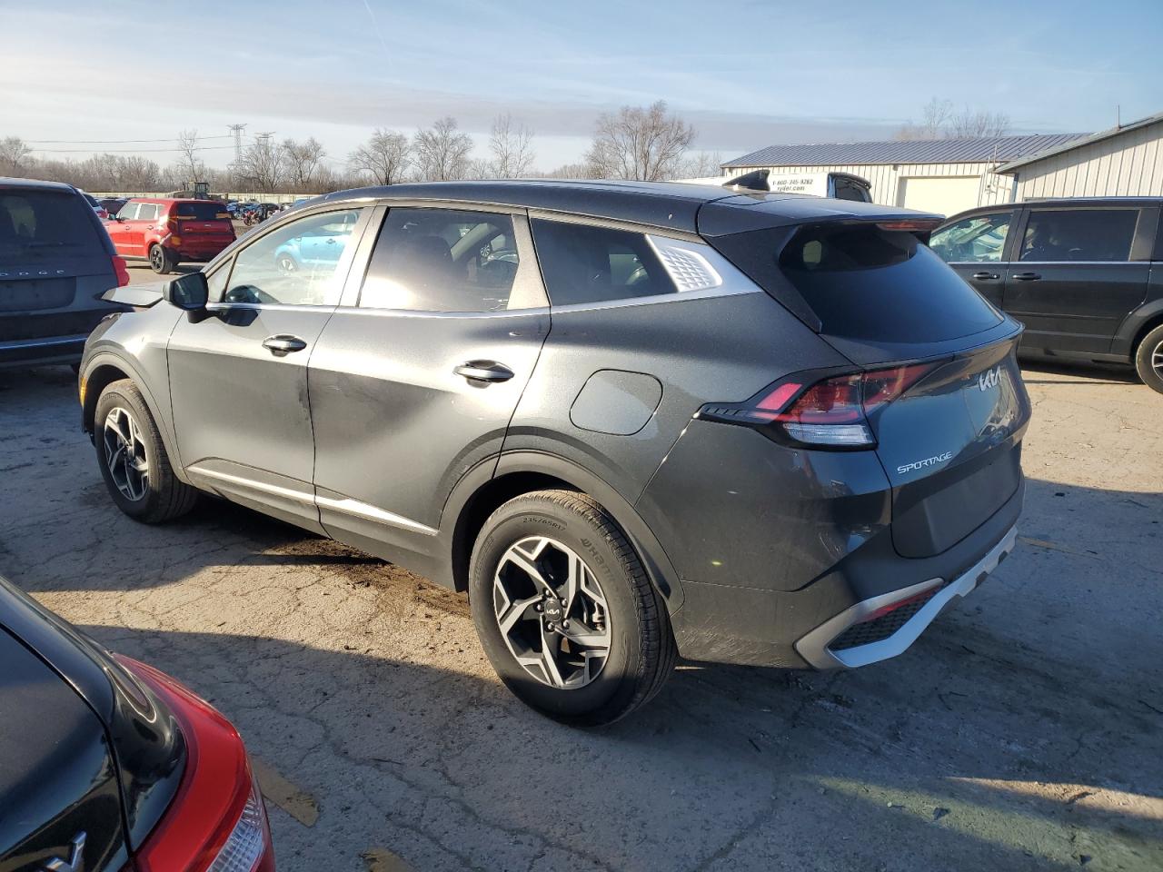 Изображение 2 2023 KIA SPORTAGE LX 2023 с VIN KNDPUCAF7P7165990