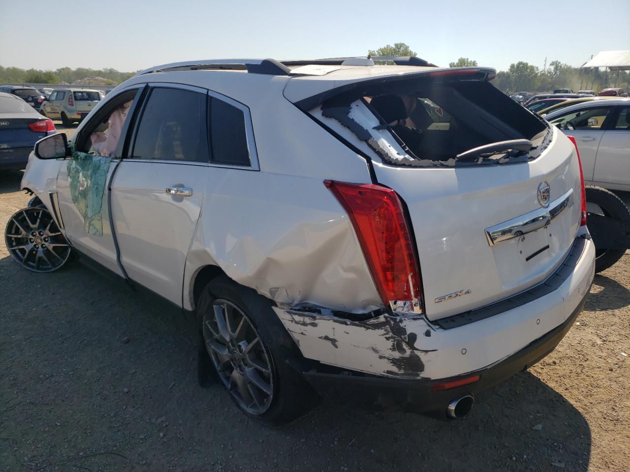 Изображение 2 2015 CADILLAC SRX PREMIUM COLLECTION 2015 с VIN 3GYFNGE38FS579094