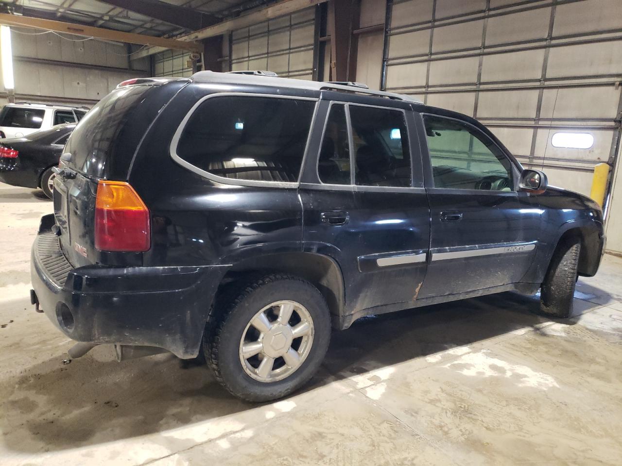 Obraz 3 z 2004 GMC ENVOY  2004 z VIN 1GKDT13S642106849