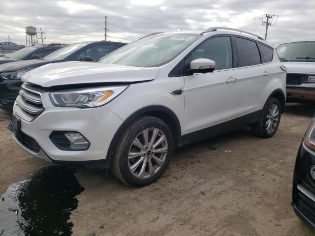Image 1 of 2017 FORD ESCAPE TITANIUM 2017 with VIN 1FMCU9J98HUA99668
