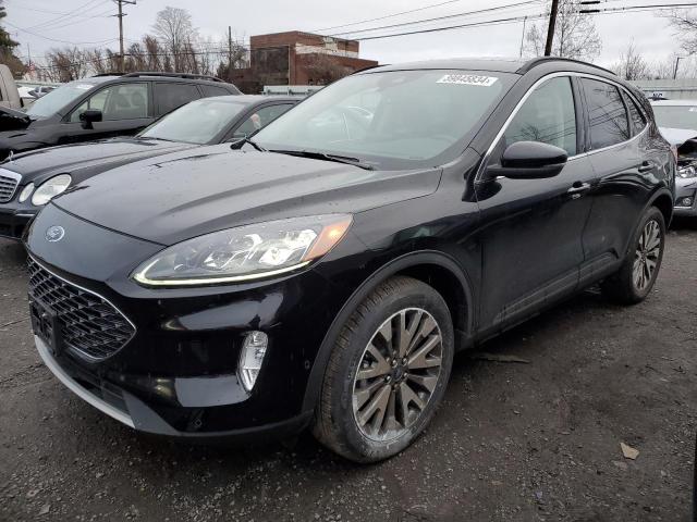 Image 1 of 2020 FORD ESCAPE TITANIUM 2020 with VIN 1FMCU9J93LUC66656