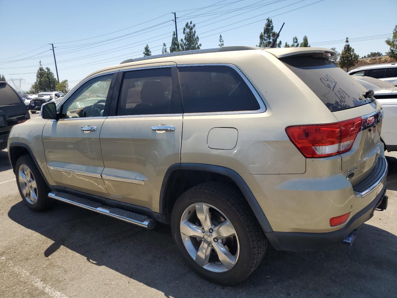 Изображение 2 2011 JEEP GRAND CHEROKEE OVERLAND 2011 с VIN 1J4RR6GTXBC710583