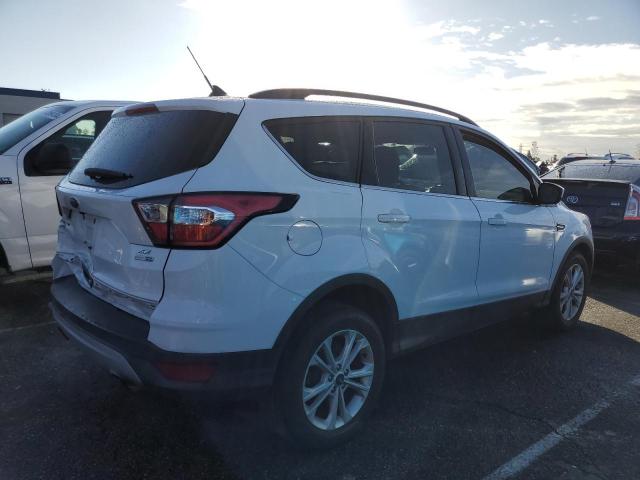 Изображение 3 2018 FORD ESCAPE SE 2018 с VIN 1FMCU9GD0JUD52161