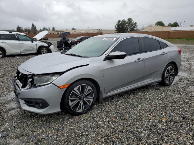 Изображение 1 2016 HONDA CIVIC EXL 2016 с VIN 2HGFC1F71GH659806