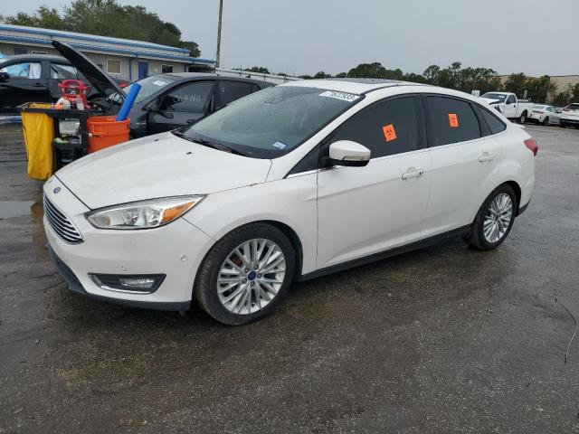 Image 1 of 2018 FORD FOCUS TITANIUM 2018 with VIN 1FADP3J24JL240494