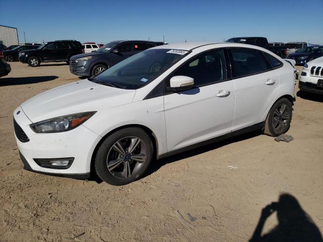 Image 1 of 2017 FORD FOCUS SE 2017 with VIN 1FADP3FE5HL310307