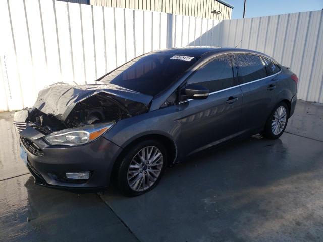Image 1 of 2017 FORD FOCUS TITANIUM 2017 with VIN 1FADP3J28HL287439