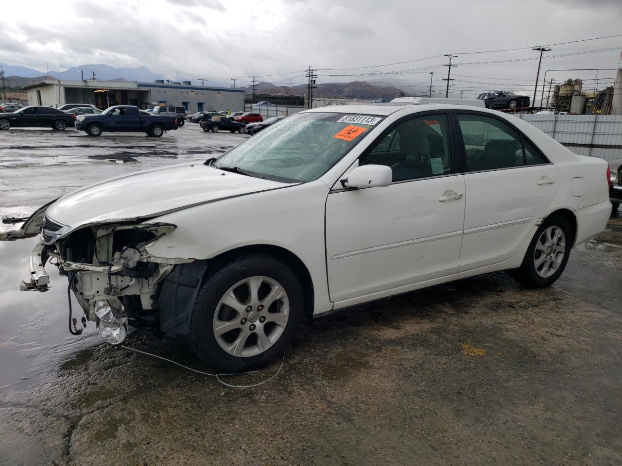 Image 1 of 2004 TOYOTA CAMRY LE 2004 with VIN JTDBE32K240255250