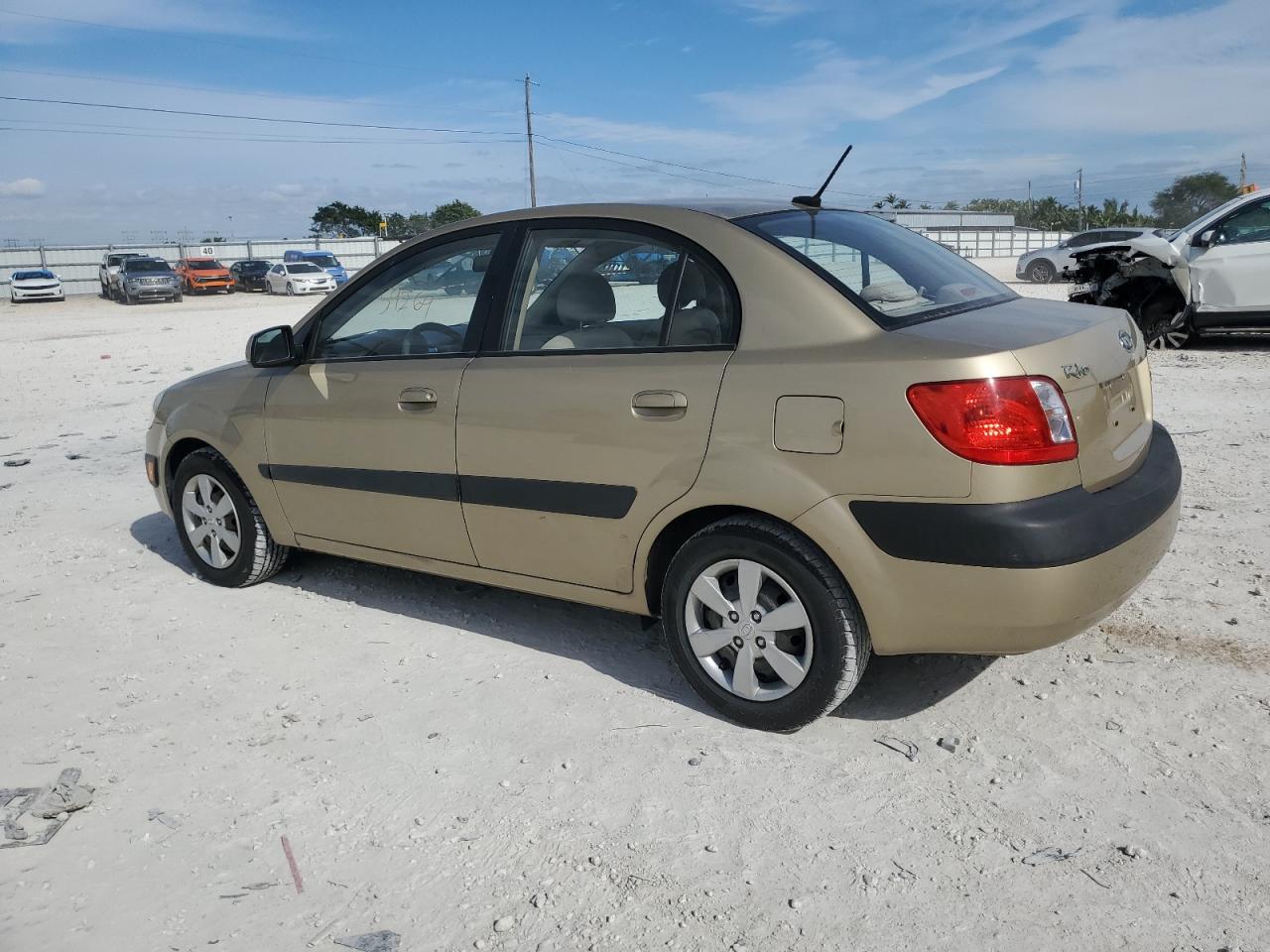 Изображение 2 2009 KIA RIO BASE 2009 с VIN KNADE223396463389