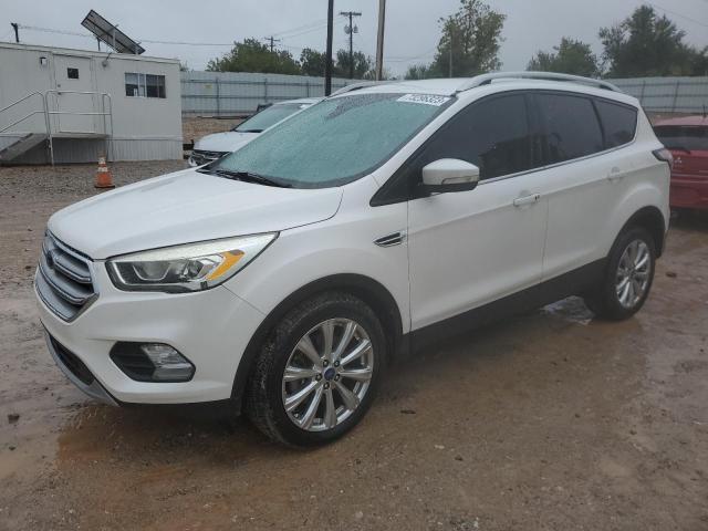 Image 1 of 2017 FORD ESCAPE TITANIUM 2017 with VIN 1FMCU0J97HUE92119