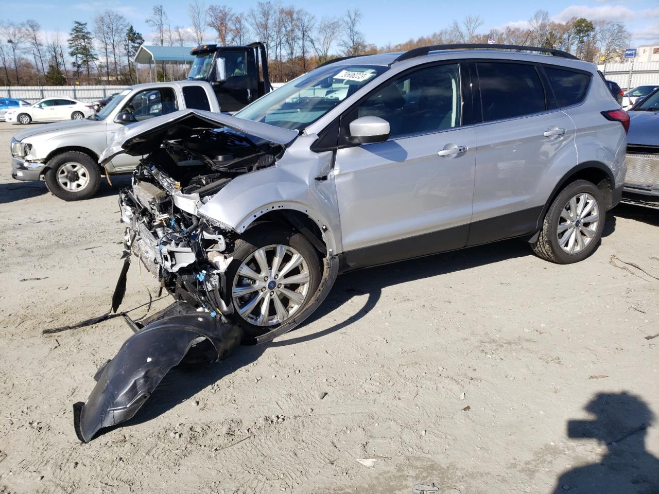 Image 1 of 2019 FORD ESCAPE SEL 2019 with VIN 1FMCU9HDXKUA39540
