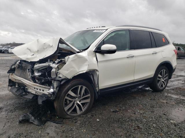 Изображение 1 2018 HONDA PILOT TOURING 2018 с VIN 5FNYF6H92JB028005