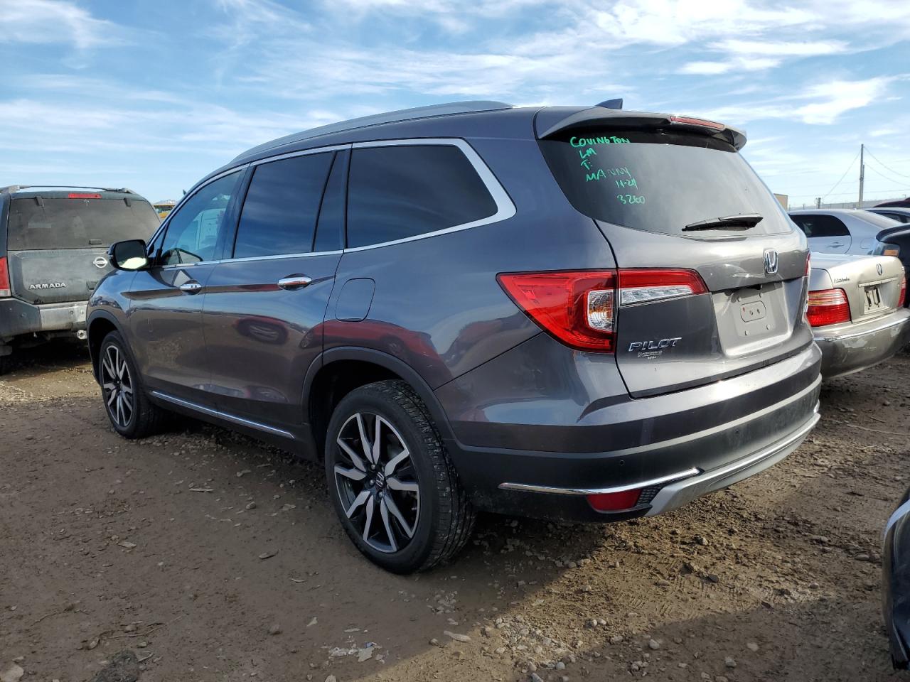 Изображение 2 2021 HONDA PILOT TOURING 2021 с VIN 5FNYF6H68MB033591