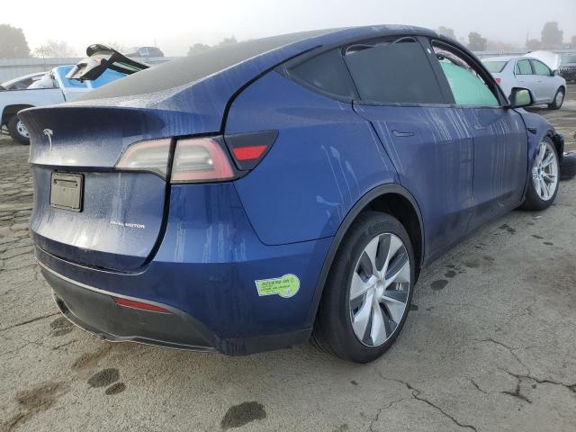Obraz 3 z 2023 TESLA MODEL Y  2023 z VIN 7SAYGAEE7PF634672