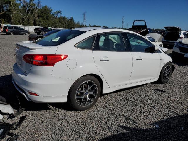 Image 3 of 2016 FORD FOCUS SE 2016 with VIN 1FADP3F27GL304710