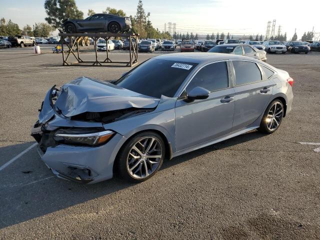 Изображение 1 2022 HONDA CIVIC TOURING 2022 с VIN 2HGFE1F92NH320478