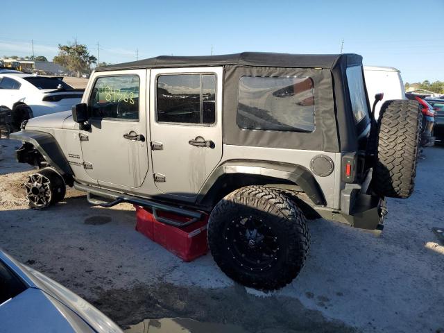 Изображение 2 Jeep Wrangler Unlimited Sport 2014 с VIN 1C4BJWDG2EL156160
