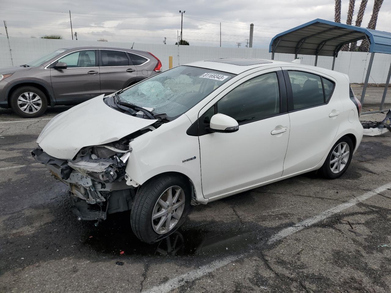 Изображение 1 2015 TOYOTA PRIUS C  2015 с VIN JTDKDTB36F1094619