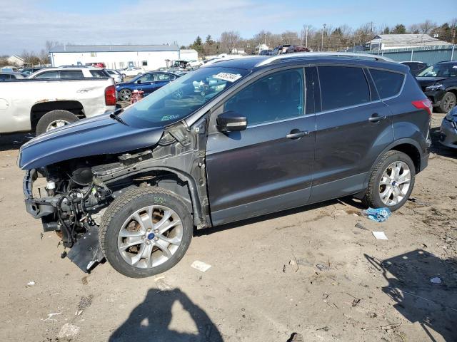 Obraz 1 z 2016 FORD ESCAPE TITANIUM 2016 z VIN 1FMCU9J97GUB43125