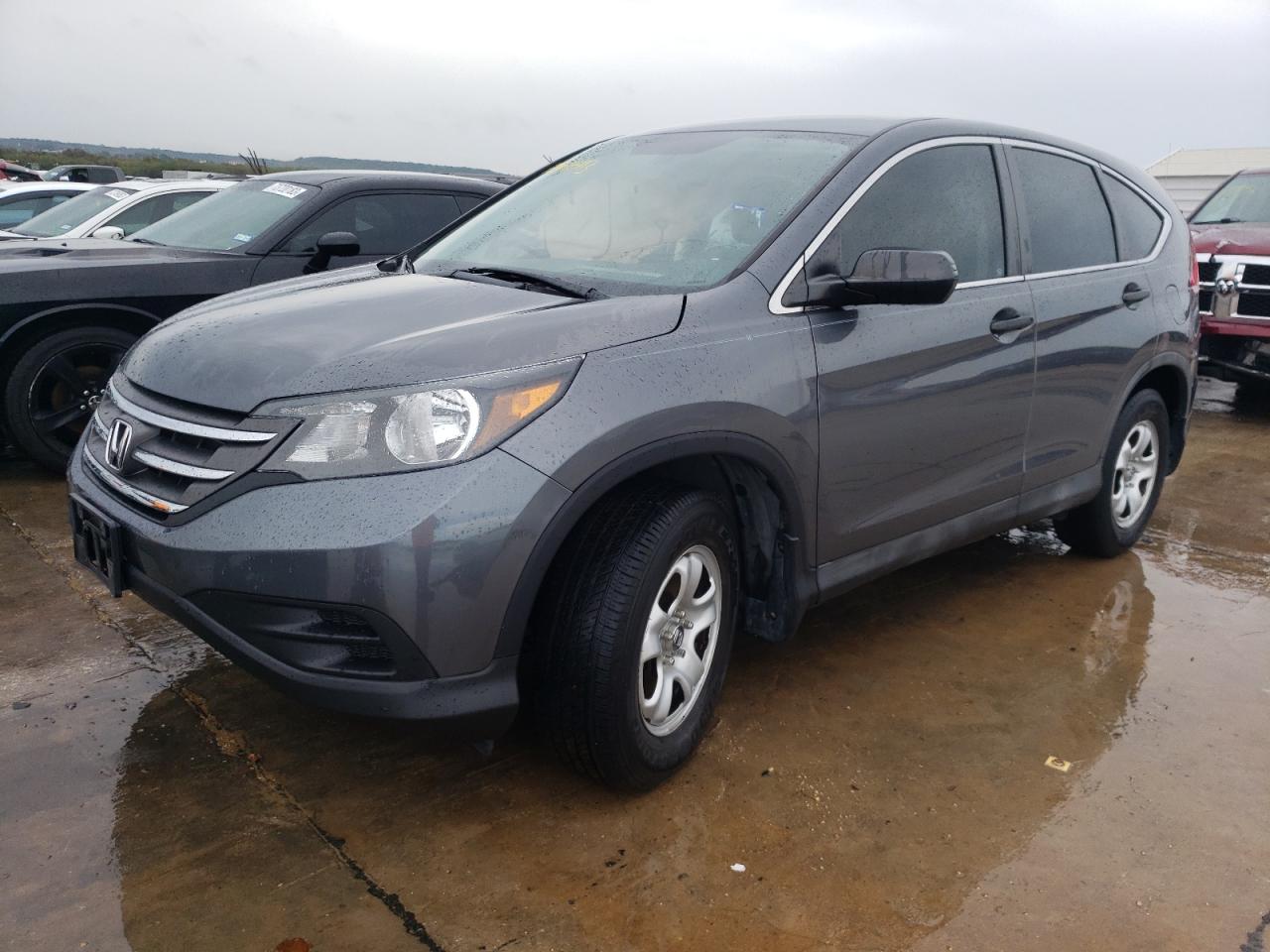 Obraz 1 z Honda Cr-V Lx 2014 z VIN 3CZRM3H31EG706550