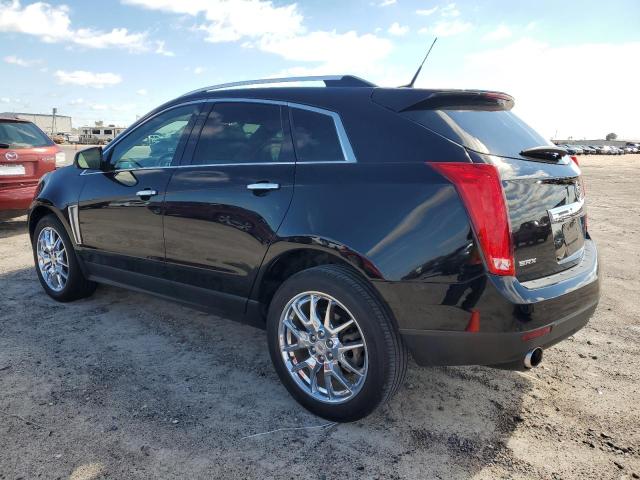 Изображение 2 2014 CADILLAC SRX PREMIUM COLLECTION 2014 с VIN 3GYFNDE38ES598936