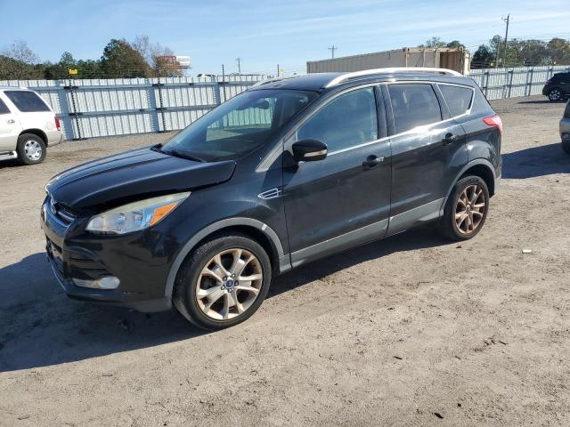 Obraz 1 z 2014 FORD ESCAPE TITANIUM 2014 z VIN 1FMCU9J91EUE52585