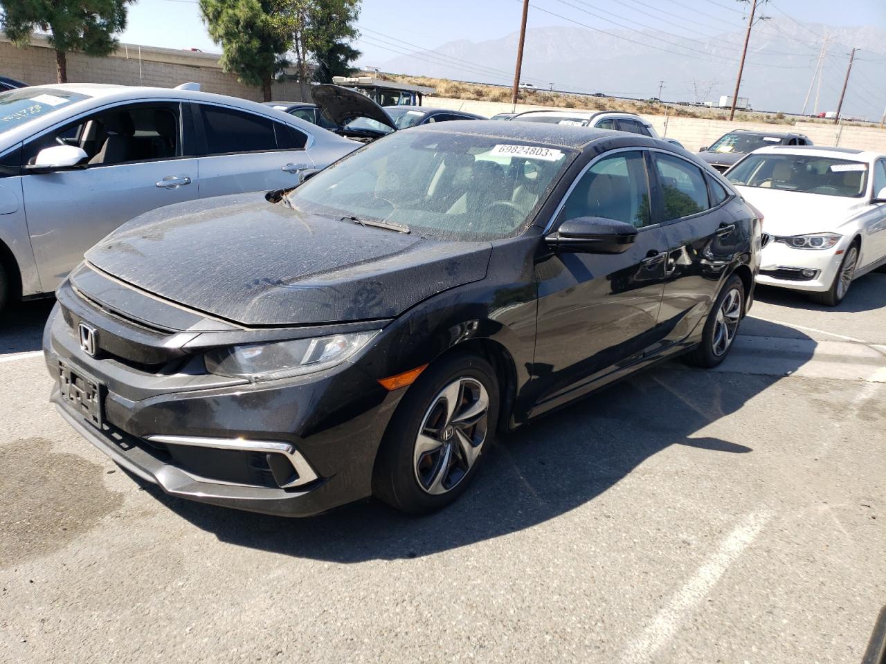 Изображение 1 2019 HONDA CIVIC LX 2019 с VIN 19XFC2F61KE213848