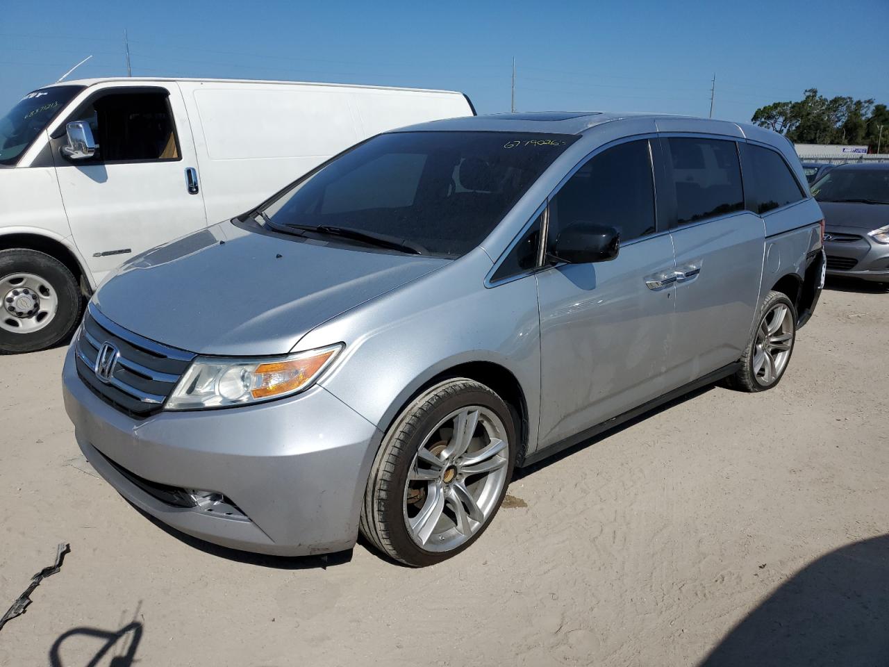 Image 1 of Honda Odyssey Exl 2012 with VIN 5FNRL5H67CB054809