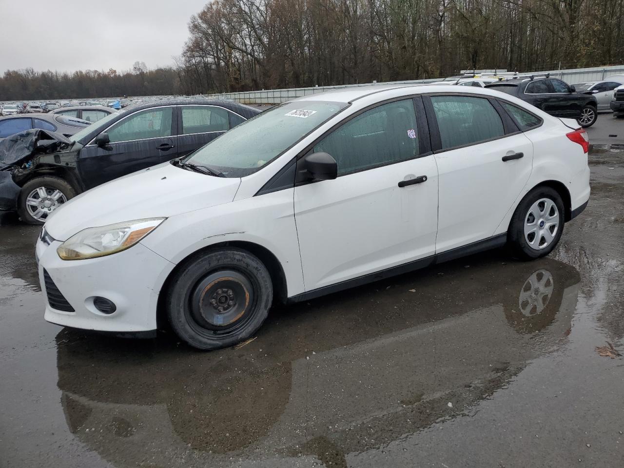 Image 1 of 2013 FORD FOCUS S 2013 with VIN 1FADP3E25DL125093