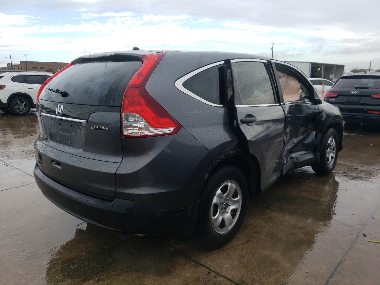 Image 3 of Honda Cr-V Lx 2014 with VIN 3CZRM3H31EG706550