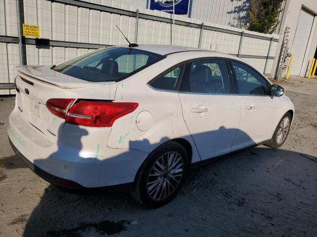 Image 3 of 2016 FORD FOCUS TITANIUM 2016 with VIN 1FADP3J21GL327696