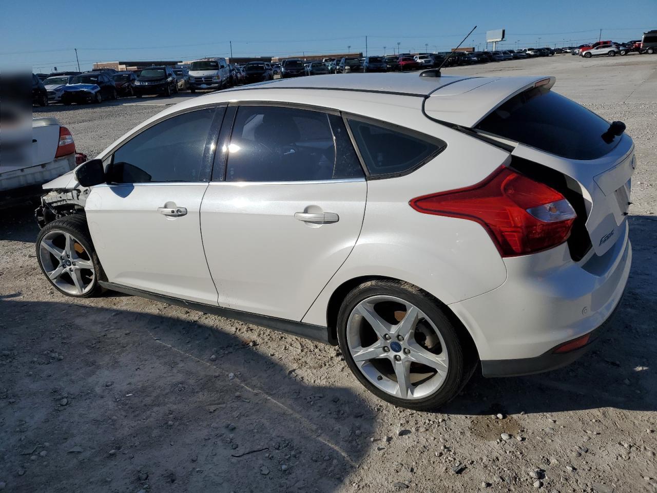 Obraz 2 z 2012 FORD FOCUS TITANIUM 2012 z VIN 1FAHP3N22CL365654