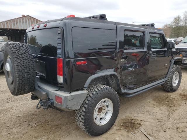 Image 3 of 2006 Hummer H2 2006 with VIN 5GRGN23UX6H121895