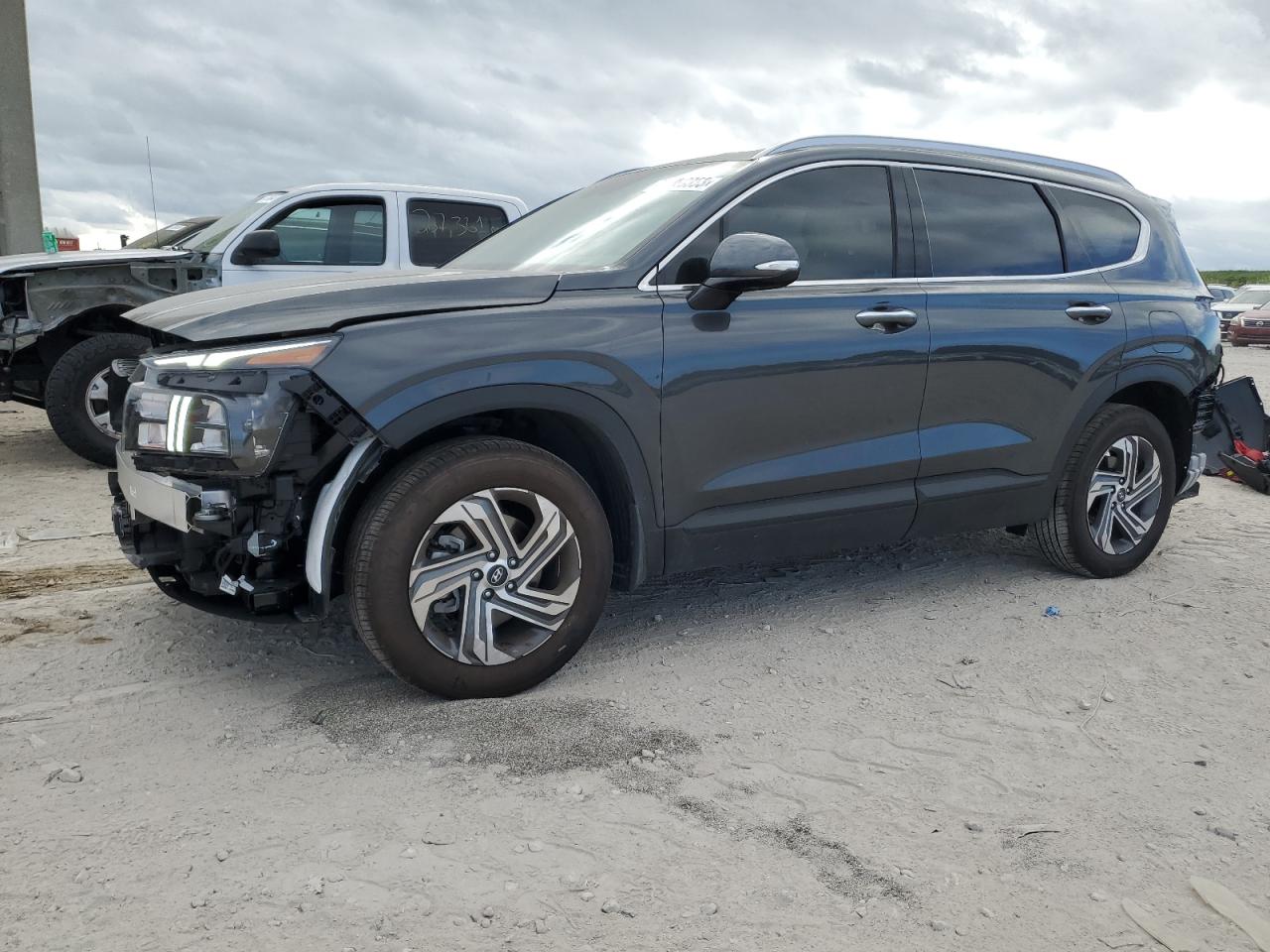 Image 1 of 2023 HYUNDAI SANTA FE SEL 2023 with VIN 5NMS24AJ8PH613866