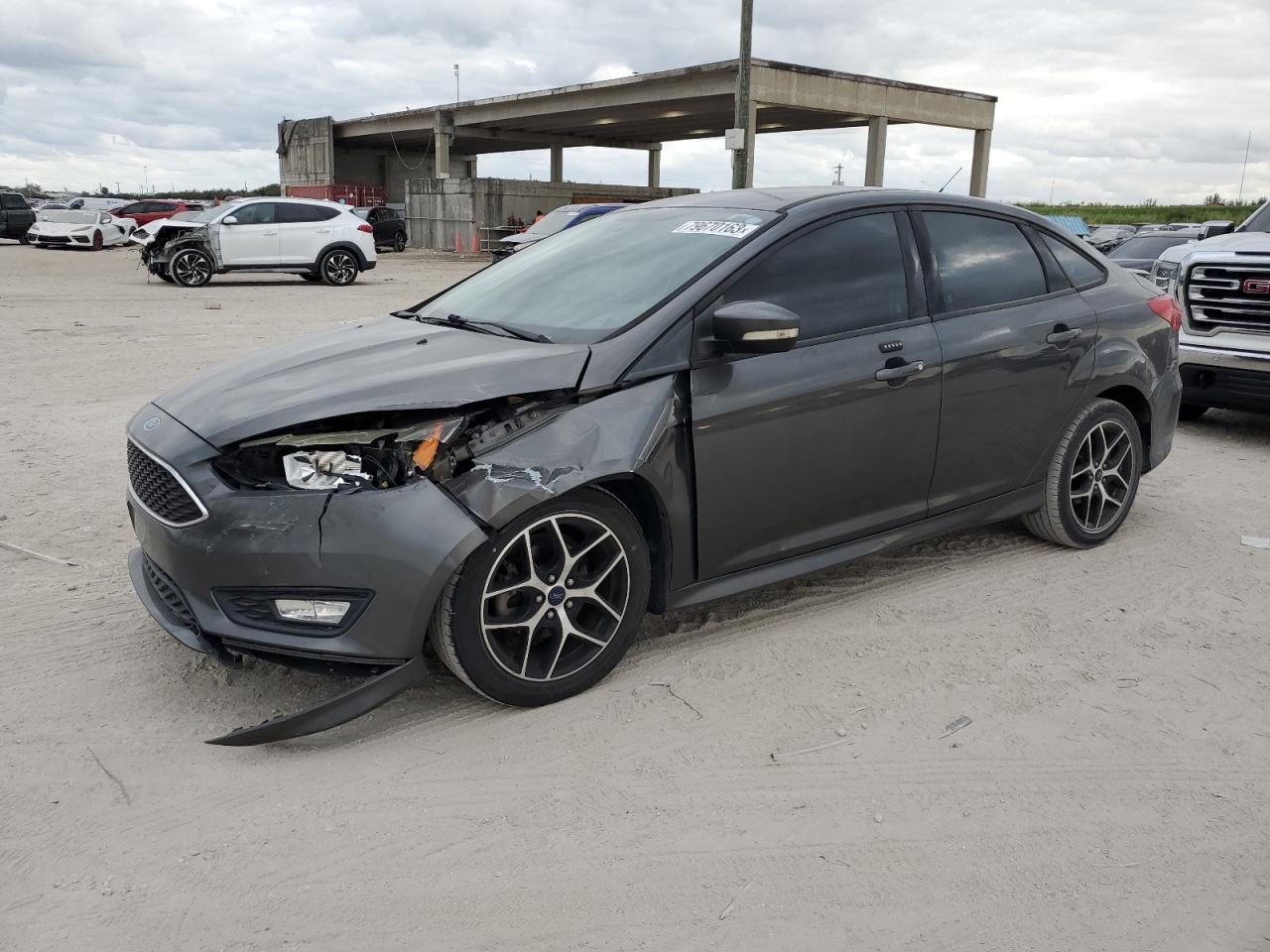 Obraz 1 z 2015 FORD FOCUS SE 2015 z VIN 1FADP3F23FL382030