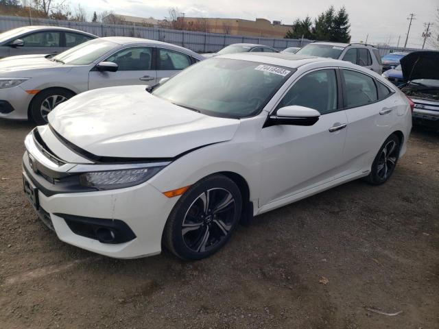 Изображение 1 2017 HONDA CIVIC TOURING 2017 с VIN 2HGFC1F93HH105685