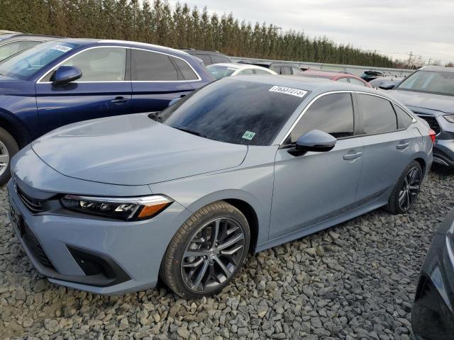 Image 1 of 2024 HONDA CIVIC TOURING 2024 with VIN 2HGFE1F93RH307504