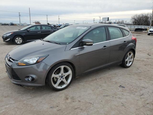 Image 1 of 2014 FORD FOCUS TITANIUM 2014 with VIN 1FADP3N25EL398648