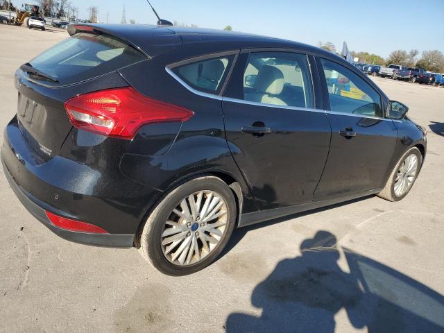 Image 3 of 2015 FORD FOCUS TITANIUM 2015 with VIN 1FADP3N24FL247317