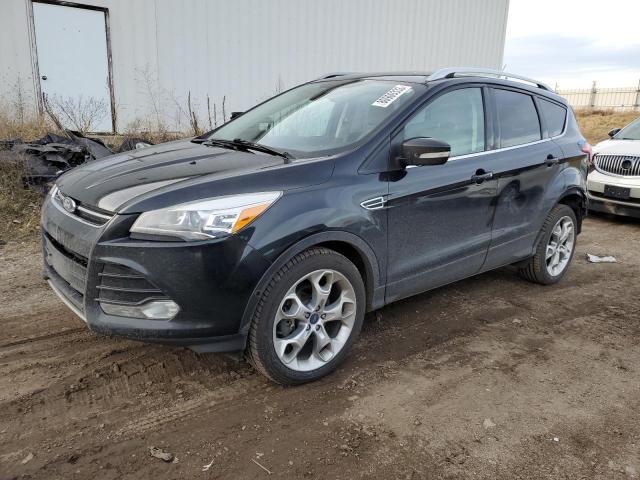 Obraz 1 z 2014 FORD ESCAPE TITANIUM 2014 z VIN 1FMCU0J98EUE57925