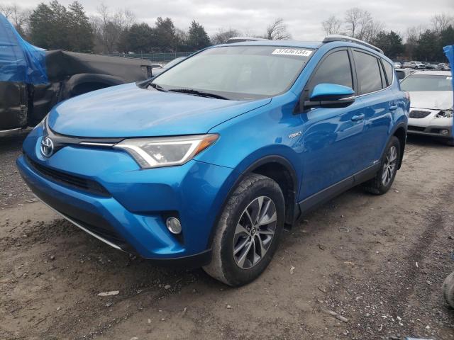 Obraz 1 z 2016 TOYOTA RAV4 HV XLE 2016 z VIN JTMRJREV4GD007128