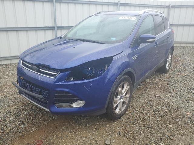 Image 1 of 2014 FORD ESCAPE TITANIUM 2014 with VIN 1FMCU9J90EUD99121